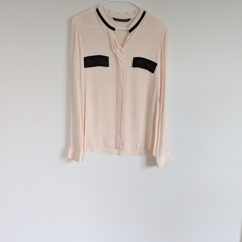 Peach blouse with front pockets